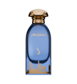 Abu Dhabi Sky by Dkhoni Eau de Parfum 100ml – blue glass bottle with gold Abu Dhabi skyline and faceted gold cap on white background