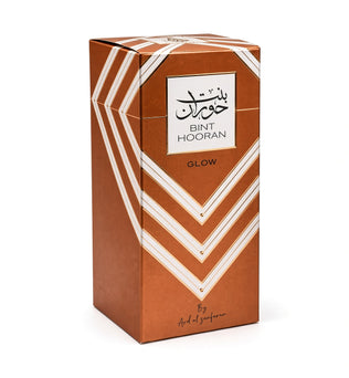 Bint Hooran Glow by Ard al Zaafaran Eau de Parfum 100ml – copper-brown gift box with white chevron stripes and Bint Hooran Glow label