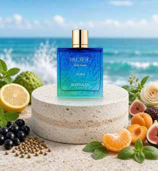 Rayhaan Pacific Aura Pour Homme 100ml bottle by the ocean with citrus, mint, apricot and fig